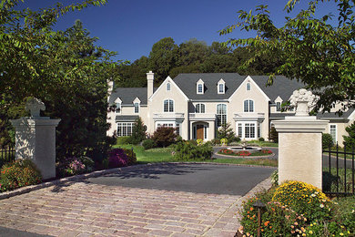 This is an example of a mid-sized victorian front yard driveway in Philadelphia.