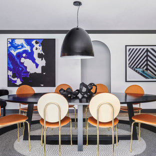 Photo of a large contemporary open plan dining in Sydney with white walls, light hardwood floors, no fireplace and grey floor.