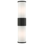 Livex Lighting - Textured Black Contemporary, Urban, Minimalistic, Clean Outdoor Wall Lantern - Add a dash of character and radiance to the exterior of your home with this wall lantern. This two-light large fixture from the Landsdale Collection features two satin opal white glass cylinder closed top shades on either side, set off with a textured black finish. The clean lines of the back plate complement the cylindrical glass shades adorned with detailed trim at the end of each glass creating a minimal, sleek look that works well in most outdoor or indoor settings. This fixture adds charm and contemporary aesthetics to your home.