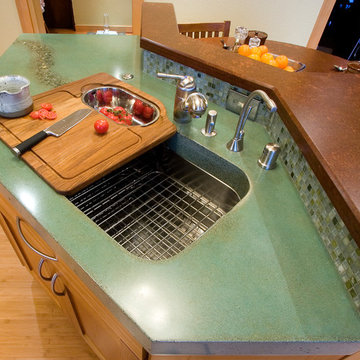 A lovely, functional island featuring this gorgeous concrete countertop.