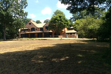 Example of a classic wood exterior home design in New York