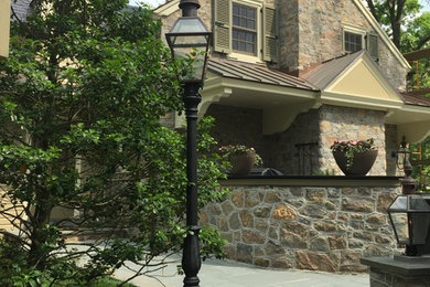 Mid-sized craftsman gray two-story stone exterior home idea in Philadelphia with a shingle roof