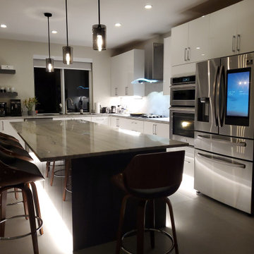 Stunning Kitchen Remodel Done in White and Gray Cabinets