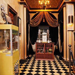 Inspiration for an eclectic home cinema in Raleigh with carpet.