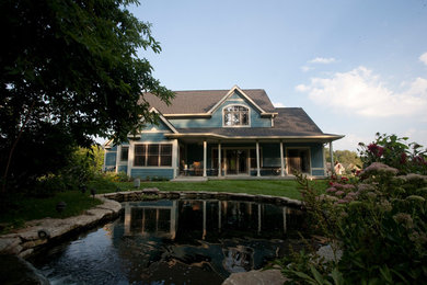 Mid-sized traditional blue two-story concrete fiberboard gable roof idea in Indianapolis
