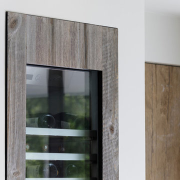 Contemporary Entertainment Room with Barnwood Bar area.