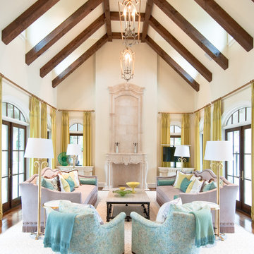 Hiding TV and lift in furniture next to furniture with matching custom cabinets