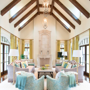 Inspiration for a small mediterranean formal open plan living room in Houston with white walls, dark hardwood flooring, a ribbon fireplace, a stone fireplace surround and a concealed tv.