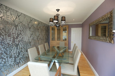 Design ideas for a contemporary dining room in Cambridgeshire.