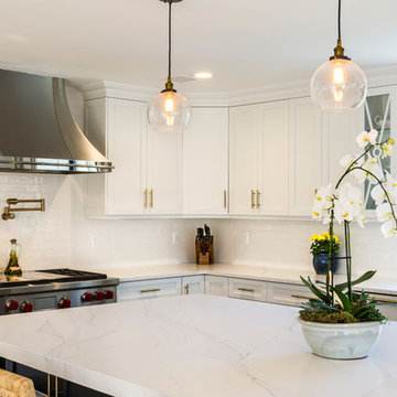White Modern Kitchen with Compac Quartz Counters and Island