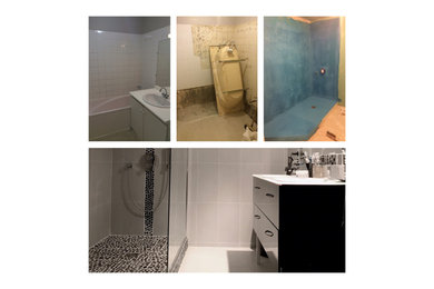 パリにあるお手頃価格の中くらいなモダンスタイルのおしゃれなバスルーム (浴槽なし) (バリアフリー、グレーのタイル、グレーの壁、アンダーカウンター洗面器、白い床、黒い洗面カウンター) の写真