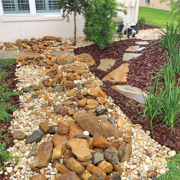 Overhaul of an existing landscape with a complex draingage solution.