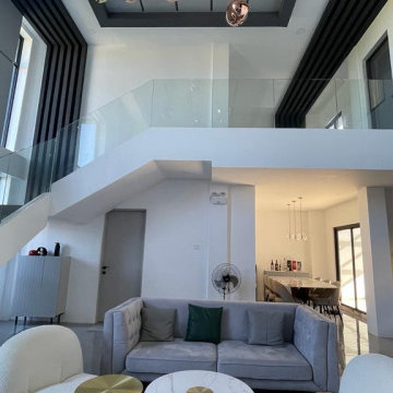 Panoramic Full View of Double Height Open Living Room