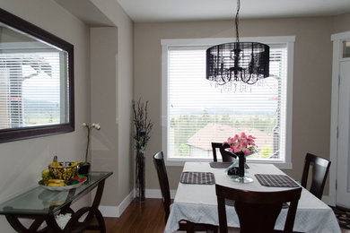 Example of a transitional dining room design in Vancouver