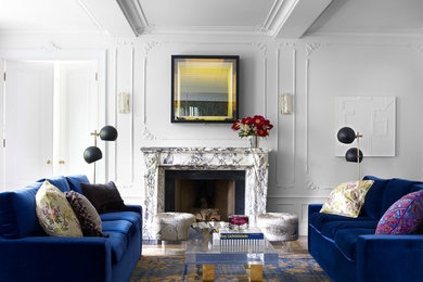Inspiration for a mid-sized 1960s formal and enclosed marble floor and beige floor living room remodel in Orange County with white walls, a standard fireplace, a stone fireplace and no tv