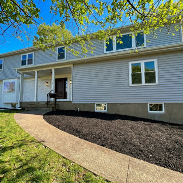 Front Facade with Walkway and White Brick Base