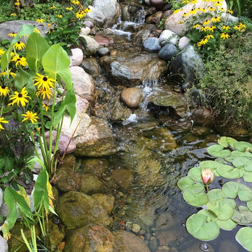 Small 6'x10' pond with 6' stream and bubbler fountain.