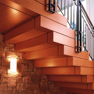 Diseño de escalera actual con escalones de madera