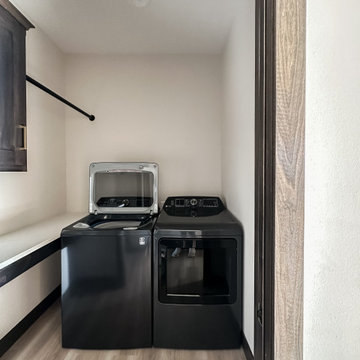 Laundry room with folder counter