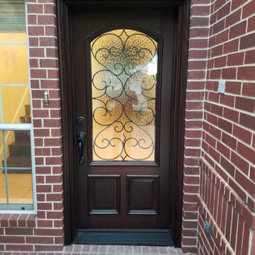Wood Doors with Wrought Iron