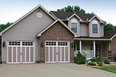Large traditional brown two-story mixed siding house exterior idea in Edmonton with a clipped gable roof and a shingle roof