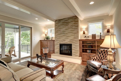 Example of a transitional living room design in Minneapolis with a tile fireplace