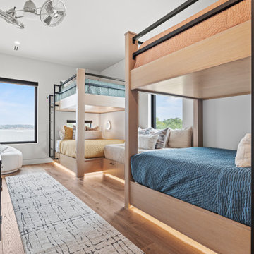 Modern Luxury Lakehouse Bunk Bedroom with Custom Built-In Beds and Lake Views