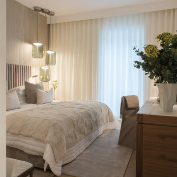 Primary Bedroom with Bed, Bench and Curtains