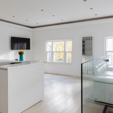 Kitchen island, glass balustrade, italian design leather sofa