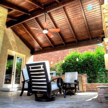 Grand home addition with outdoor kitchen see through fireplace - km