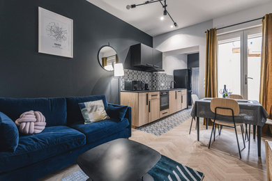 Idee per un soggiorno contemporaneo di medie dimensioni con pareti grigie e pavimento in laminato