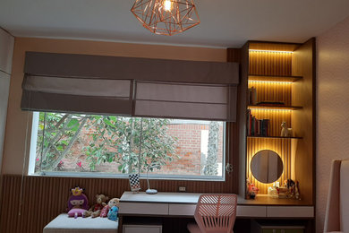 Inspiration for a mid-sized contemporary girl ceramic tile, beige floor and wall paneling kids' room remodel in Chicago with brown walls