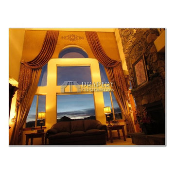 Two Story Arched Cornice Window Treatment