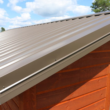A solid steel roof, overhang and soffit will help keep you cozy