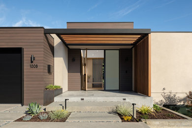 Example of a large minimalist beige two-story wood exterior home design in San Francisco
