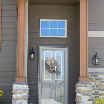 Stone Accents w/ Custom Wood Shutters