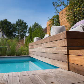 Atemberaubende Pool- und Gartenlandschaft