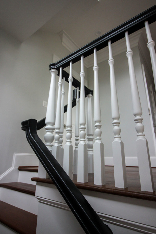 Powerful Impression by Floating Staircase in Suburban Foyer