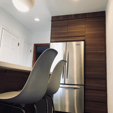 custom panels above refrigerator and pantry