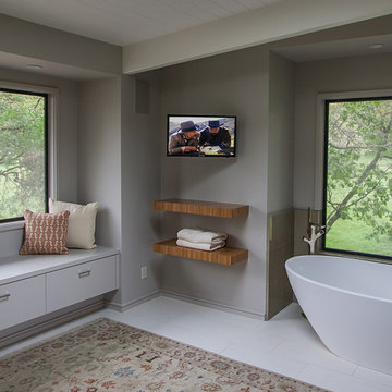 Master bath with mounted TV