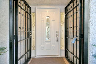 Entryway - transitional entryway idea in Orange County