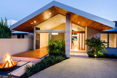Photo of a large contemporary one-storey exterior in Perth with a gable roof.