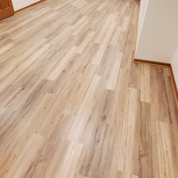 Finished basement with Duralux Performance Vinyl plank flooring