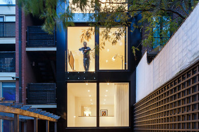 Mid-sized contemporary three-story exterior home idea in Toronto