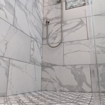 Marble and espresso bathroom