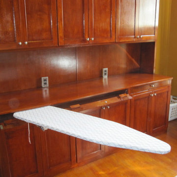 Built in full size space saving ironing board