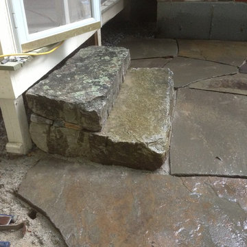 Irregular Bluestone Patio and Aged Granite Steps