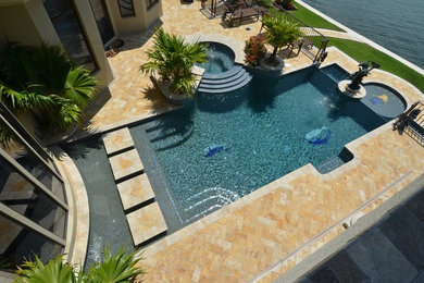 Inspiration for a contemporary pool in Tampa.