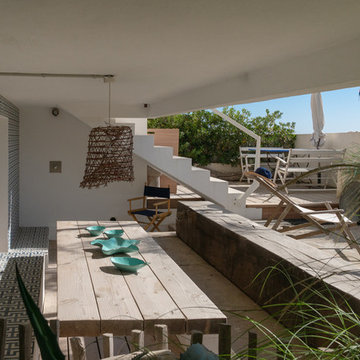 Maison face à la mer avec des carreaux de ciment dedans-dehors
