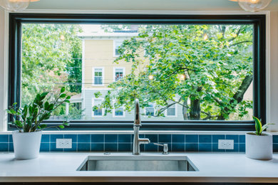 Mid-sized 1960s u-shaped enclosed kitchen photo in Boston